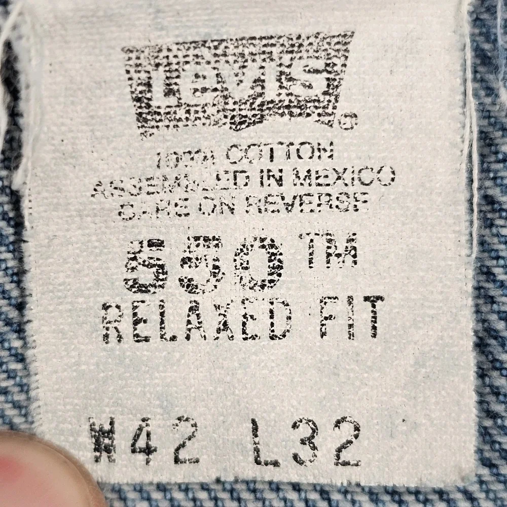 Vintage 1999 Levis 550 Relaxed Fit Jeans Mens 42x32 Medium Wash Distressed Denim